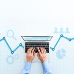 Contacto web analytics and digital marketing. top view of business man using laptop.